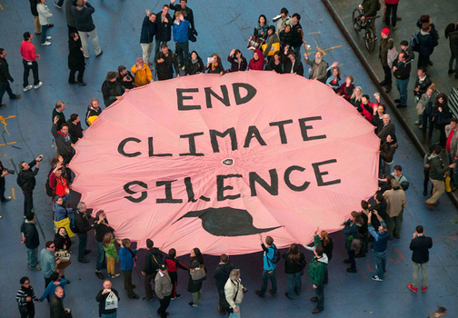 Activists Unfurl Giant ‘End Climate Silence’ Banner in Times Square