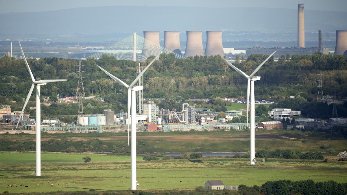 ​Wind turbines near the Fiddlers Ferry decommissioned coal-fired power station.