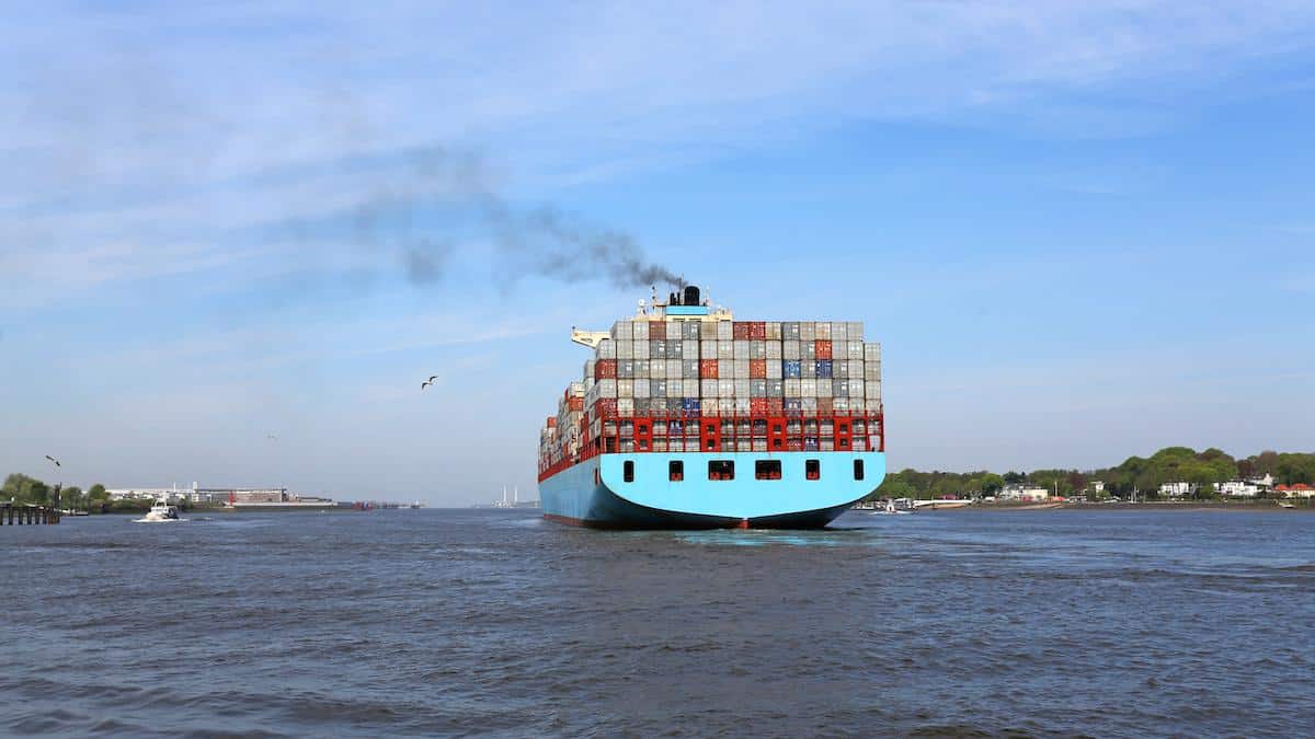 ​A containership leaving the port of Hamburg, Germany.