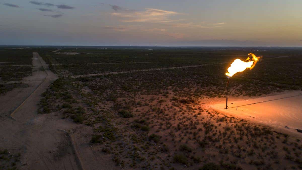 A gas flare burns in the Permian Basin in Texas.