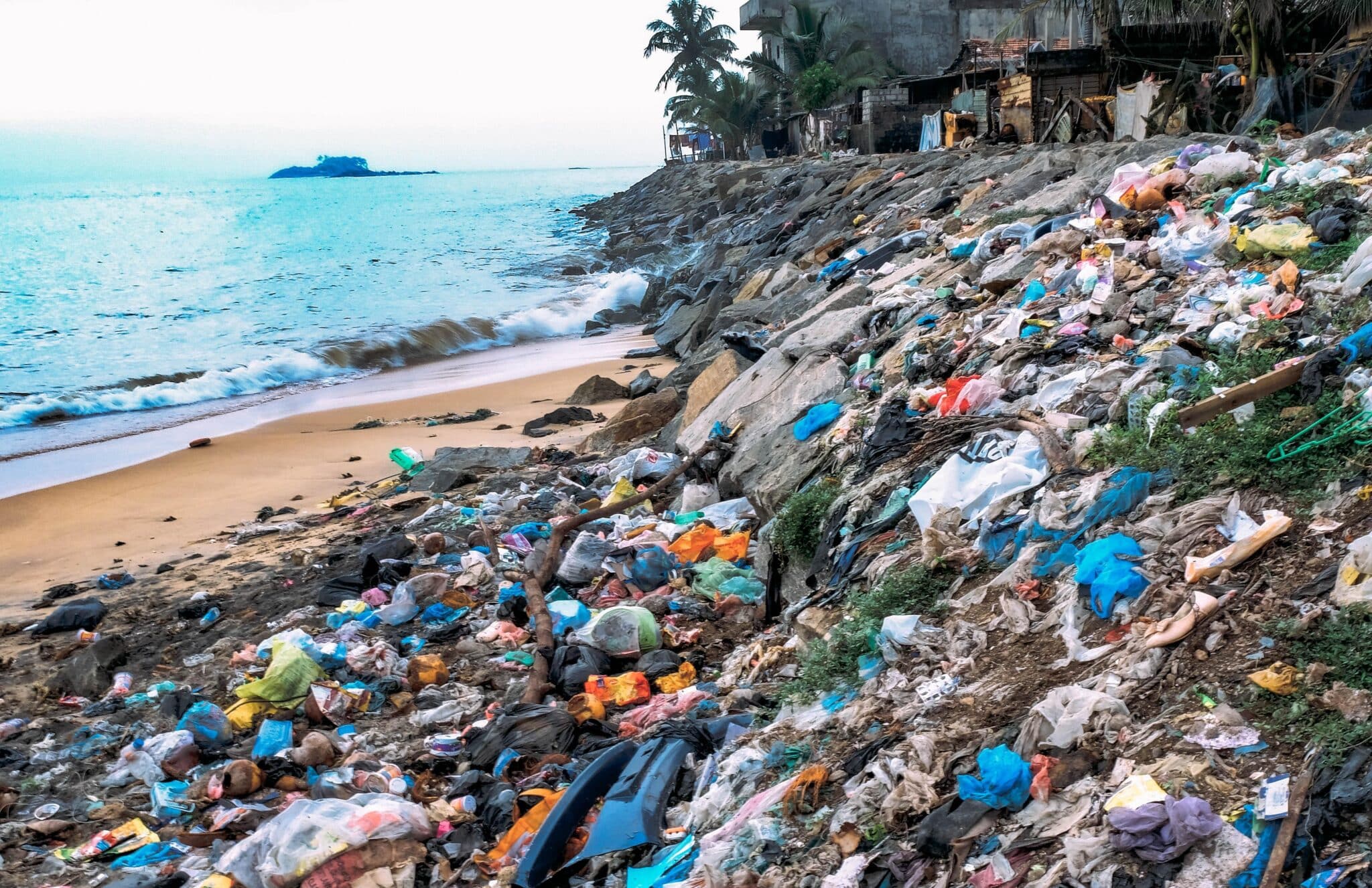 A shoreline polluted with plastic waste.