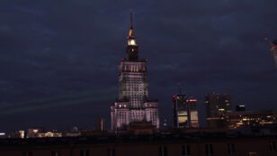 Greenpeace Beams ‘No Trump, Yes Paris’ Onto Warsaw’s Tallest Building