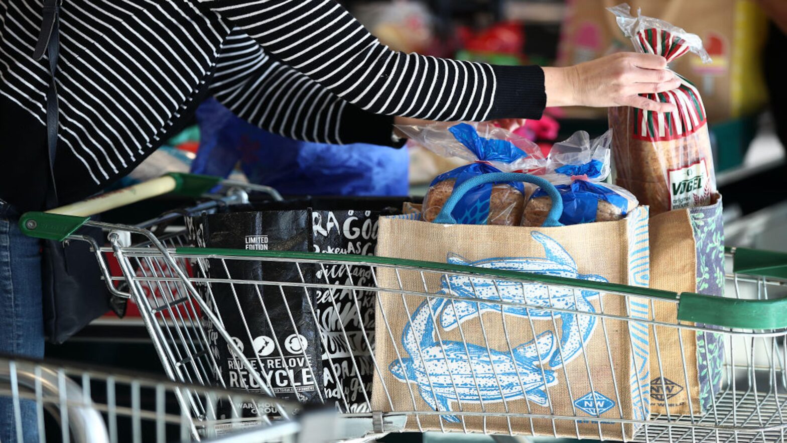 Reusable bags being packed at a supermarket in New Zealand.
