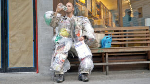 Watch This Man Walk Around NYC Wearing His Trash
