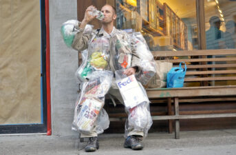 Watch This Man Walk Around NYC Wearing His Trash