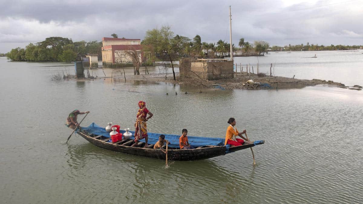 People in Bangladesh evacuate from catastrophic flooding.