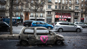 France Suspends Gas Tax as Trump Falsely Blames Paris Agreement for Riots