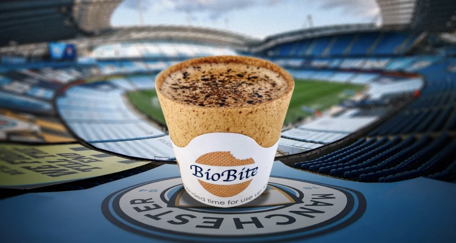 edible coffee cup with soccer stadium background