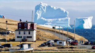 Shocking Photo Shows Massive Chunk of Ice Towering Over Town