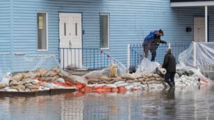 Canada Tells Flood Victims It’s Time to Move