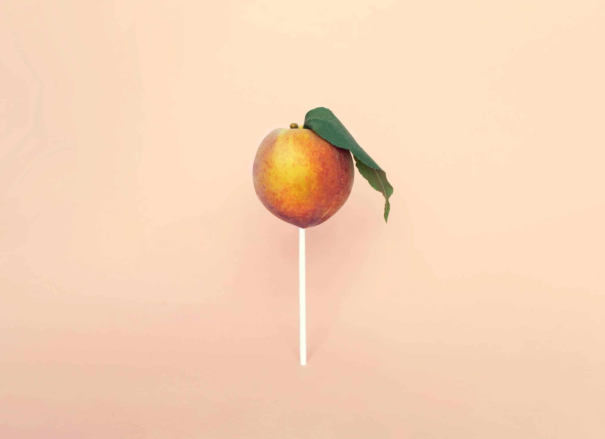 Candy-Fruit lolipop round peach on a stick