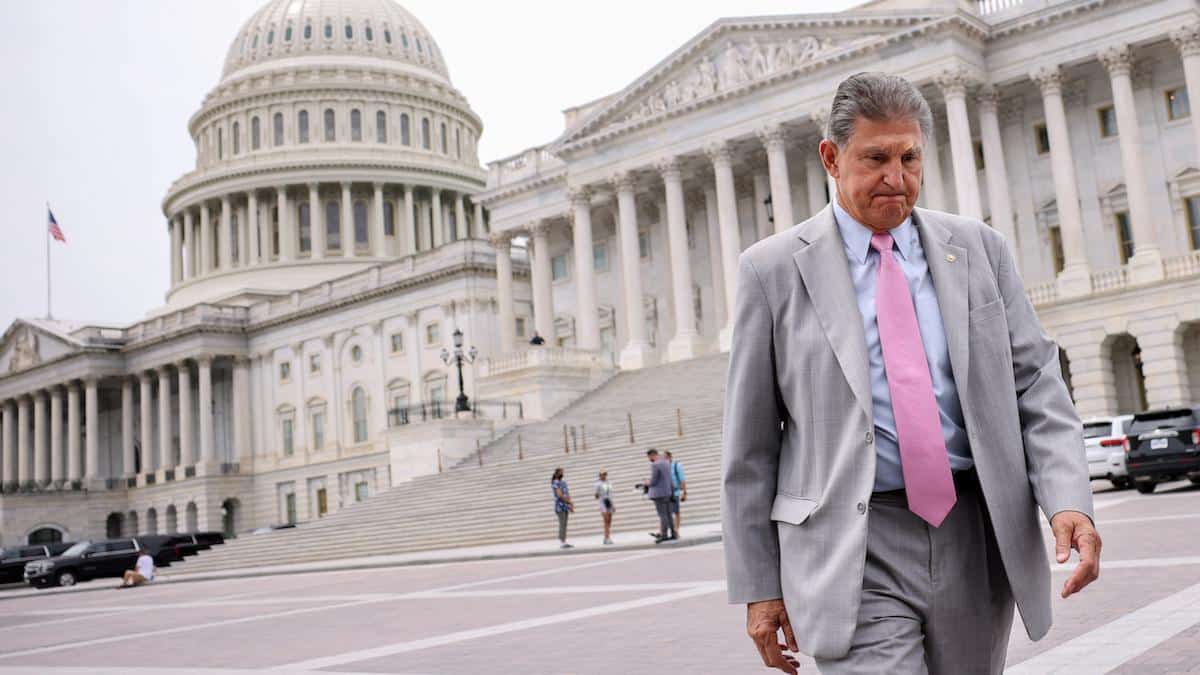 Joe Manchin walks away from the U.S. Capitol in Washington, DC after a vote.