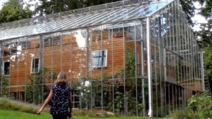 Couple Builds Greenhouse Around Home to Grow Food and Keep Warm