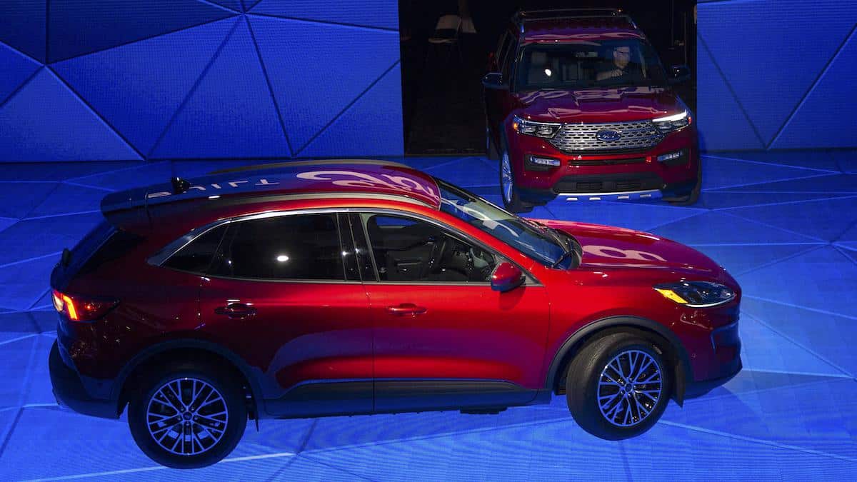 ​The electric Ford Mustang Mach-E and Ford Explorer hybrid.