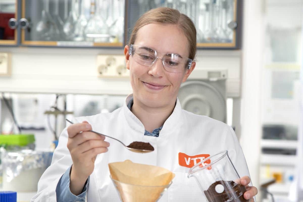 Elviira Ku00e4rkku00e4inen prepares coffee at VTT laboratory.