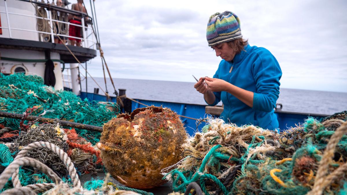 Anika Albrecht of Ocean Voyages Institute collecting plastic on an expedition in the North Pacific Subtropical Gyre.