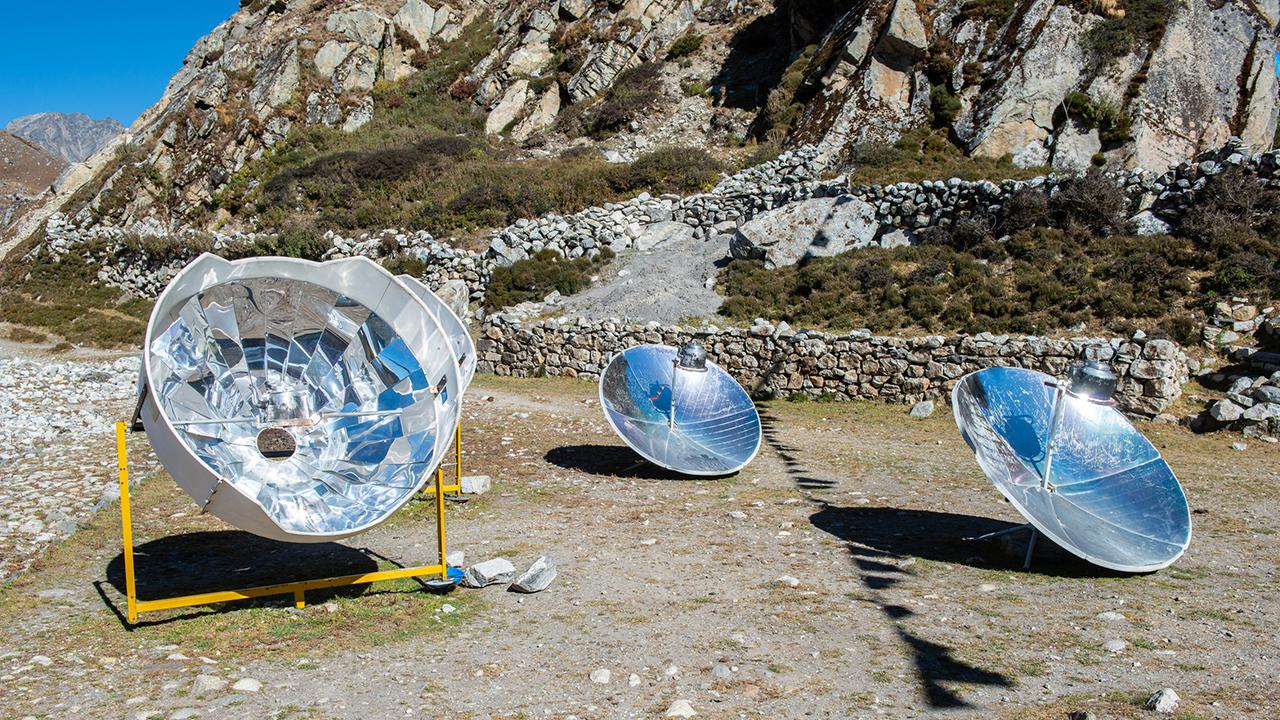 A solar cooker uses the energy of the sun to cook, reducing deforestation