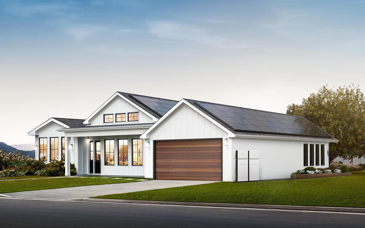 Home with Tesla solar panels and Tesla Powerwall+ Batteries