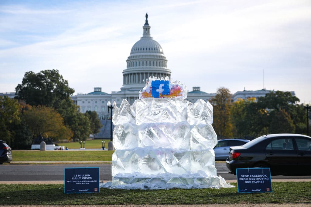 Activists bring iceberg to have it melt in front of the US Capitol