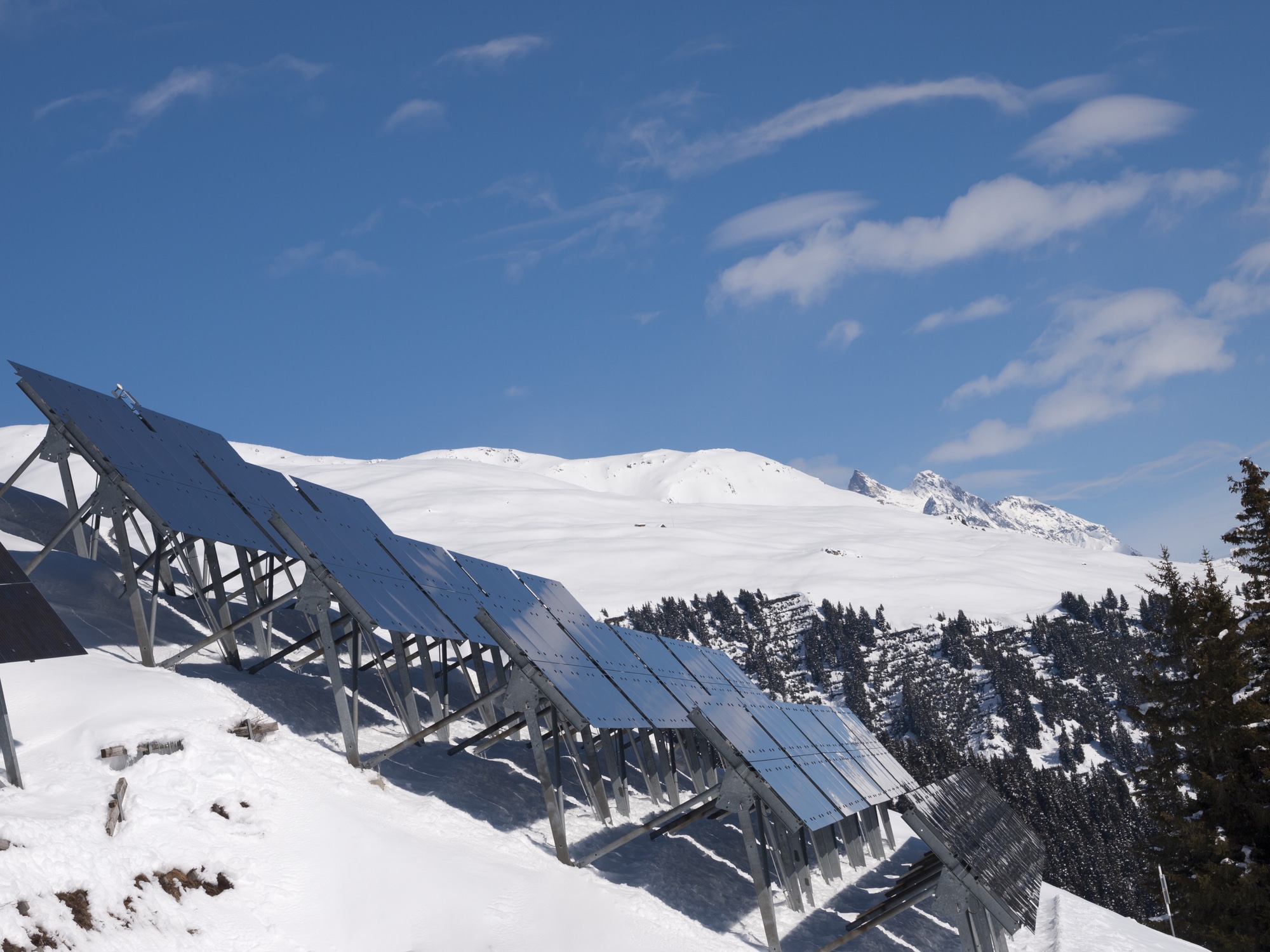 Solar panels in the snow-covered mountains