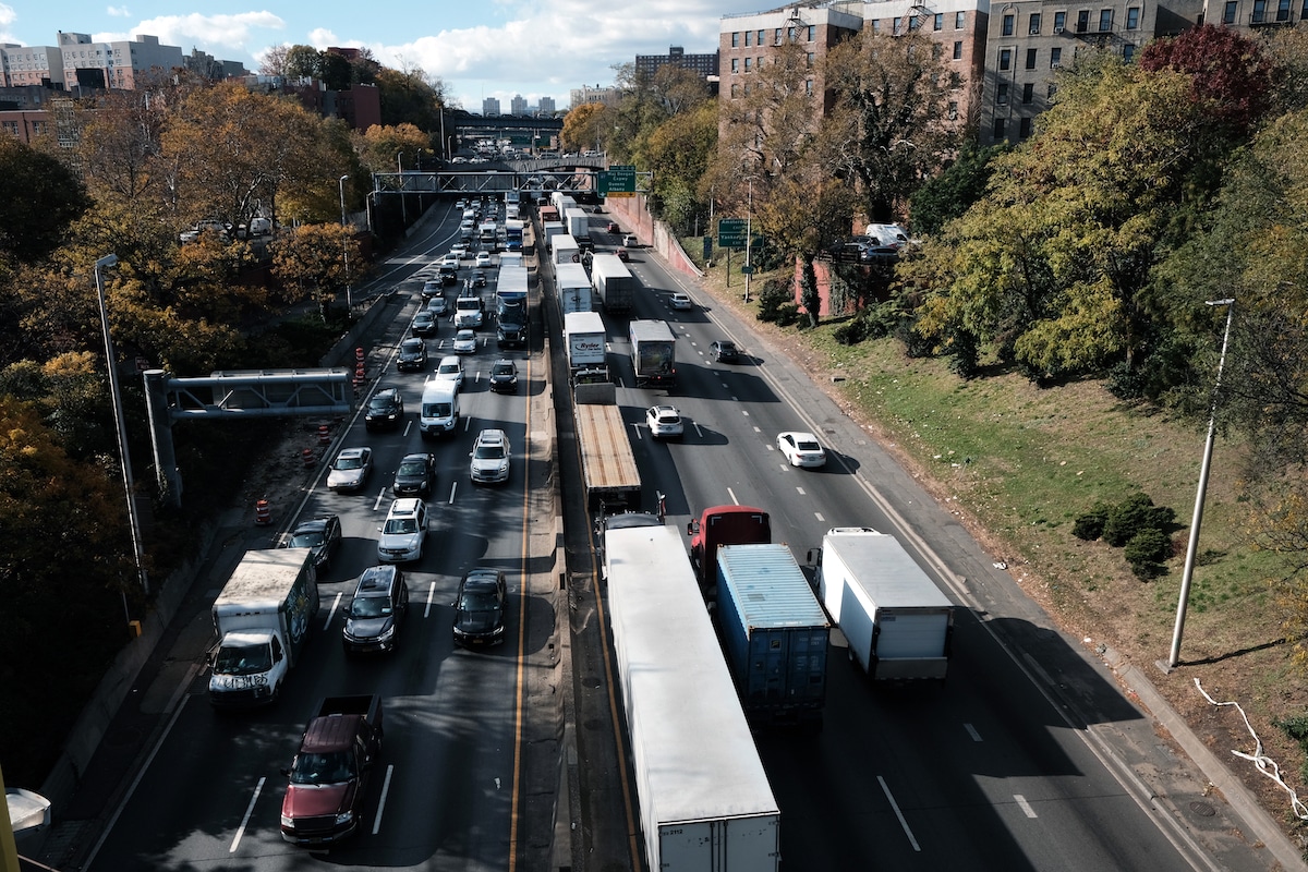 Cars and trucks move along the Cross Bronx Expressway