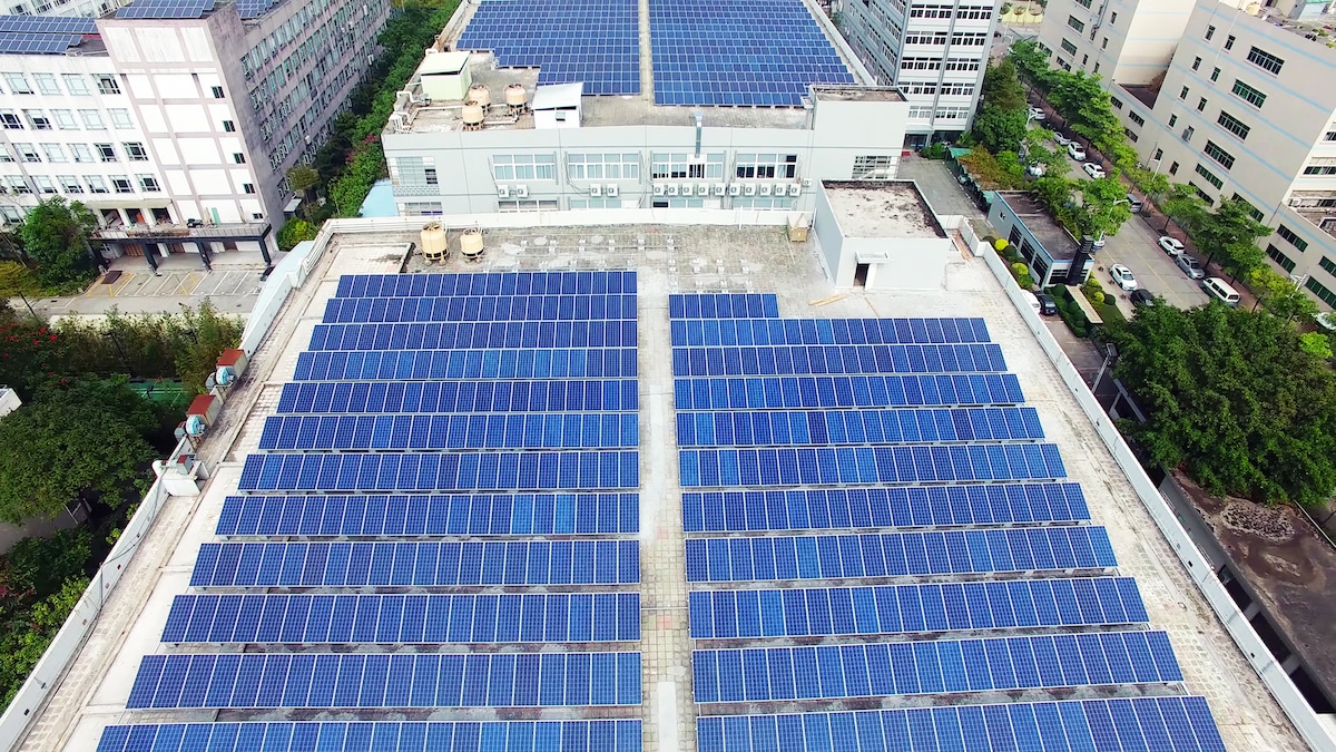Solar panels on the roof of an apartment building in California.