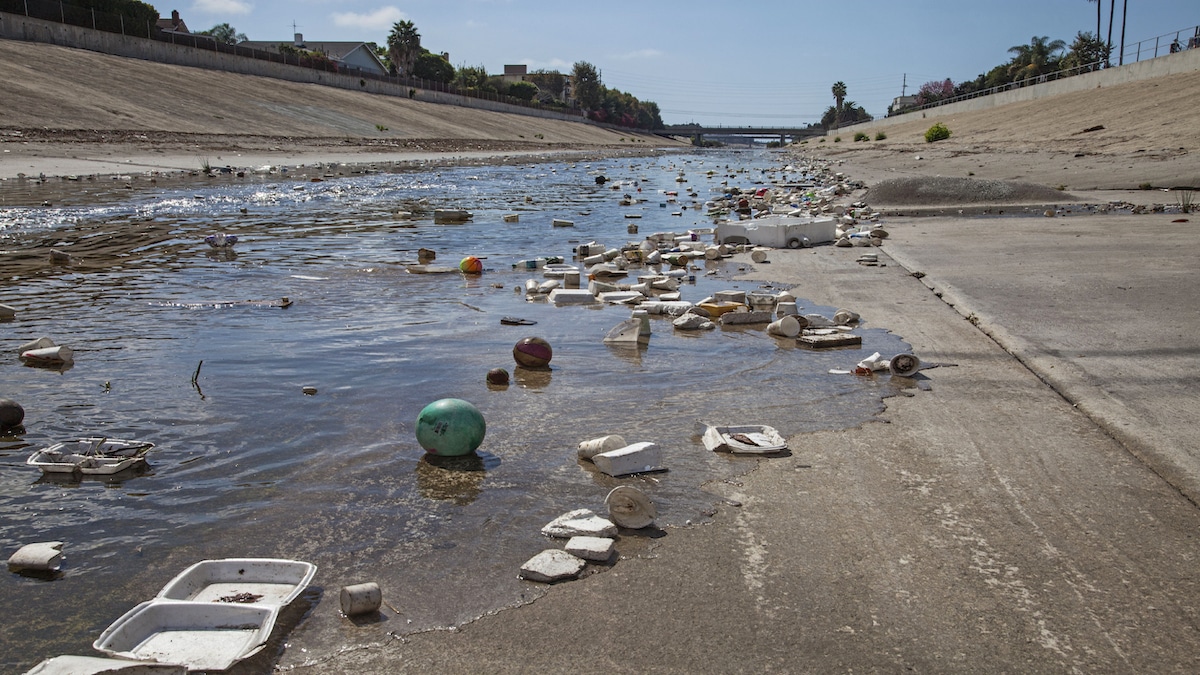 Styrofoam food containers and plastic waste in Ballona Creek in Los Angeles County, California