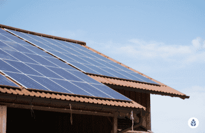 solar panels on a brick tile house roof