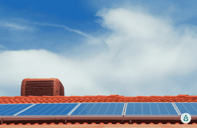 solar panels on a brick tile house roof