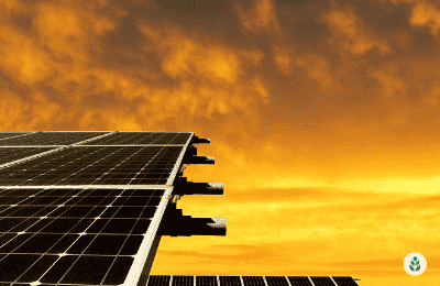 solar panels on rooftop during sunset