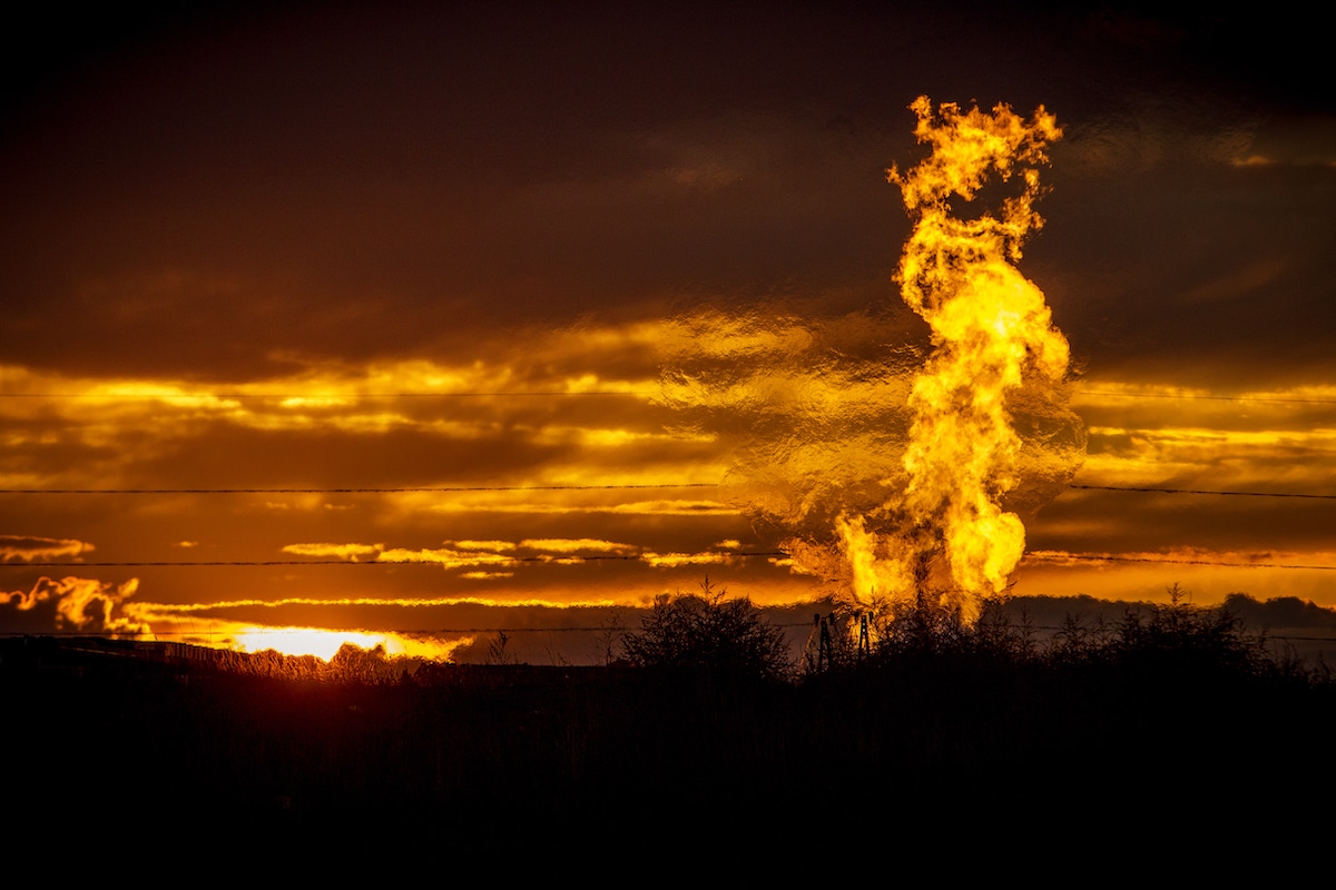 Methane flares near a well in the Bakken Oil Field