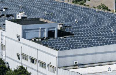 entire commercial building roof covered with solar panels
