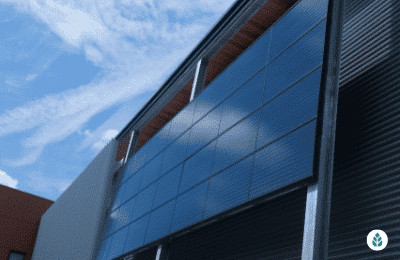 solar panels installed on the side of a commercial building