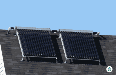 two solar panel units on a dark house roof