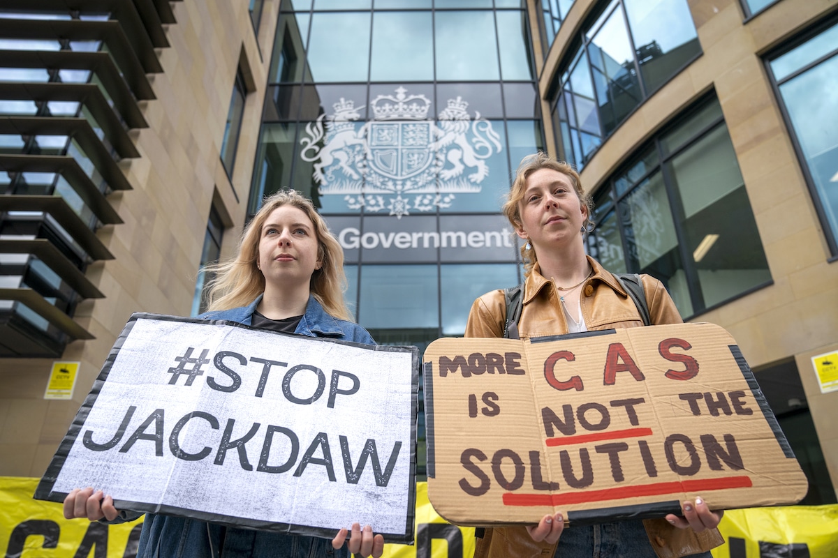 Environmental campaigners from Friends of the Earth protest outside the UK Government building in Edinburgh to demand the UK Government reverse its decision to approve Shell's Jackdaw gas field