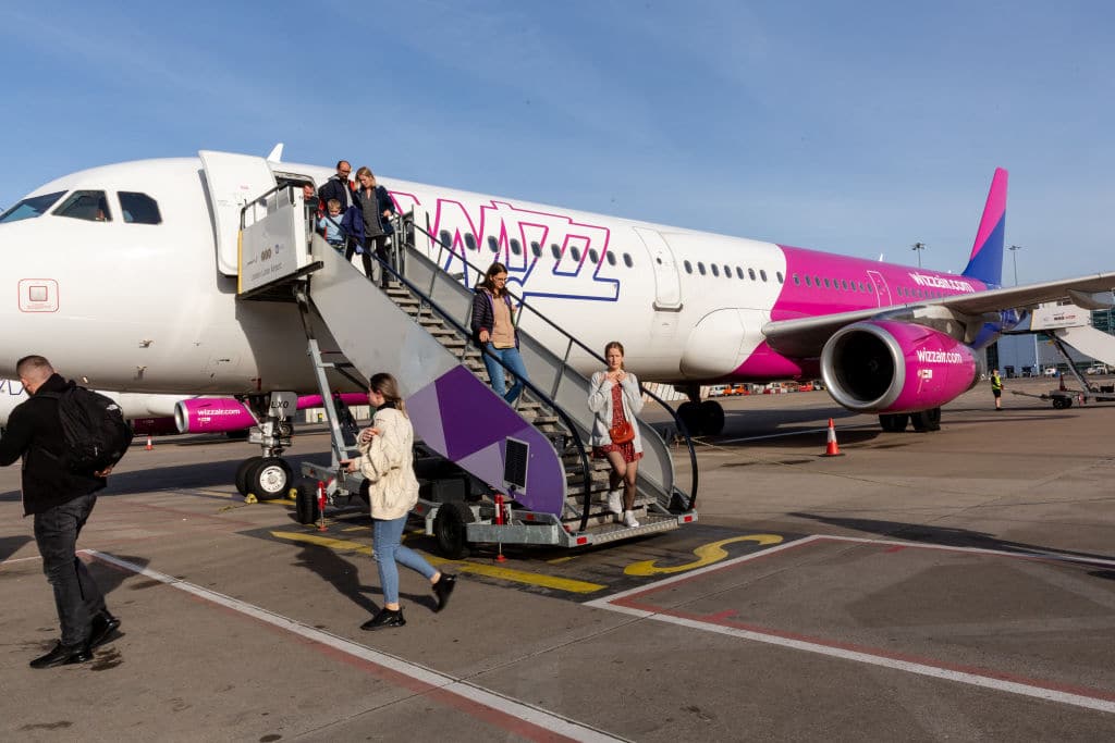 People arrive to London Luton Airport with WizzAir flight as