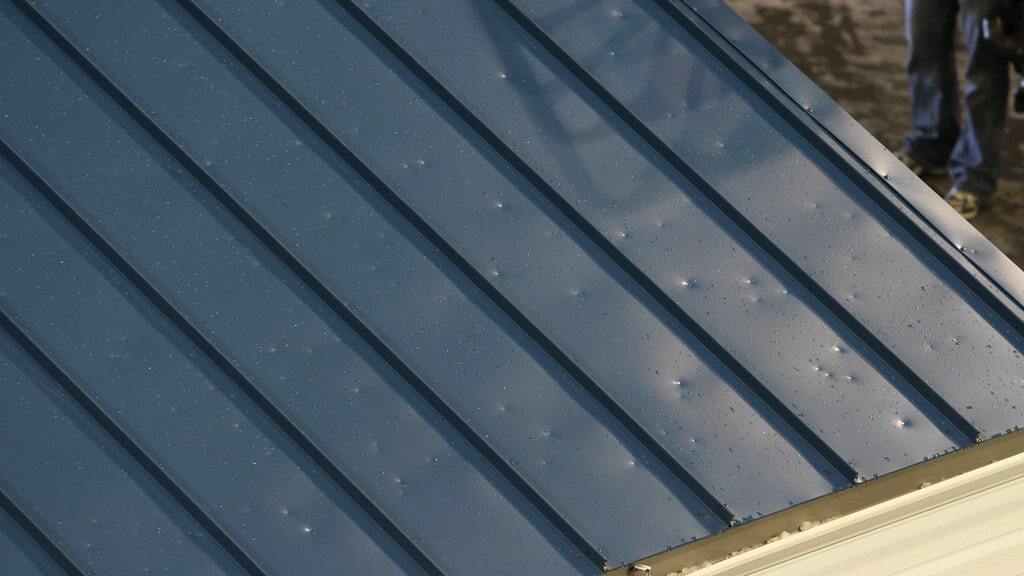 shingles vs metal roof damage