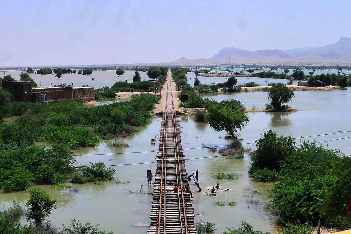 A flooding residential area near a train track in Pakistan