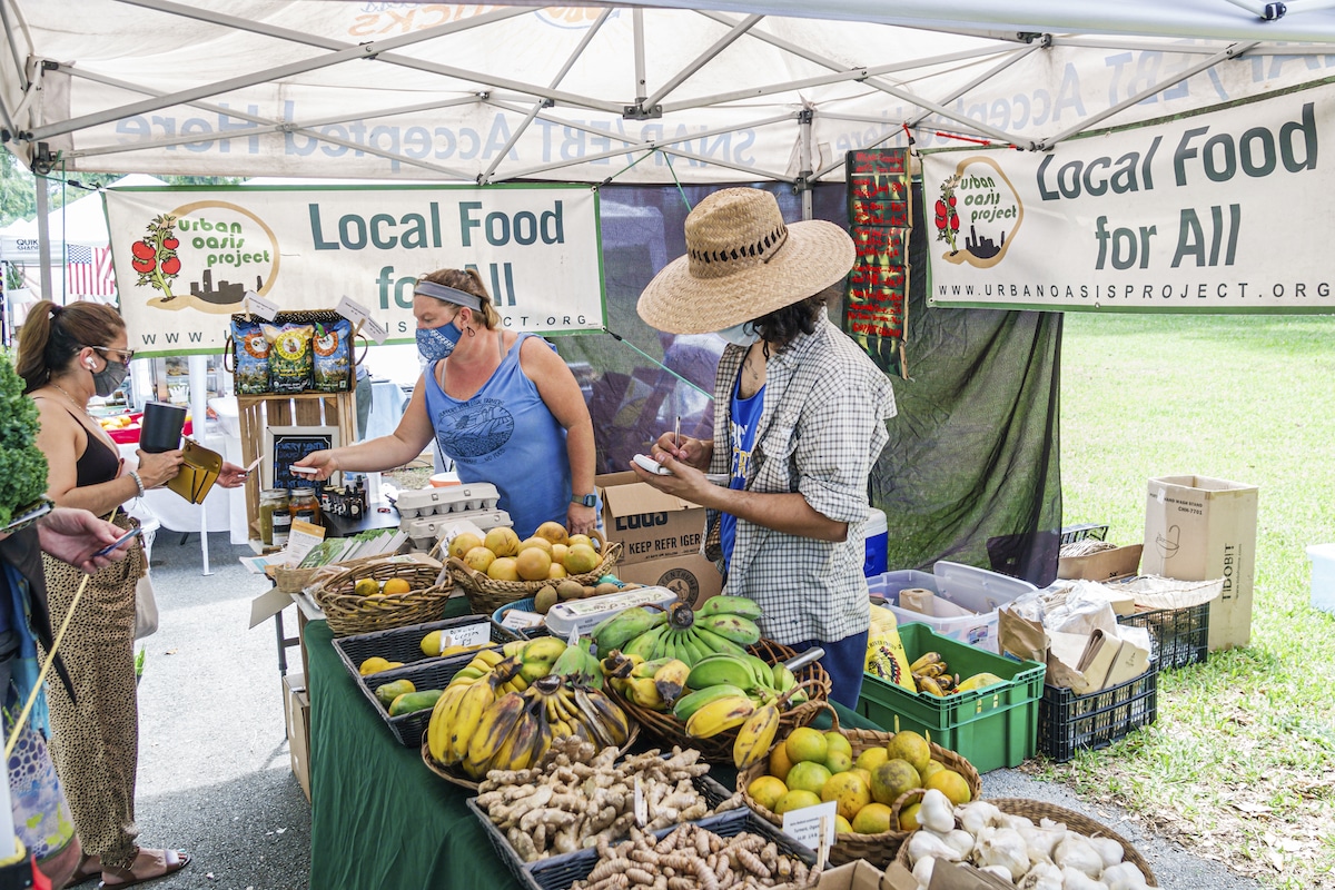 Farmers sell locally grown produce at the Legion Park Farmers Market in Miami, Florida