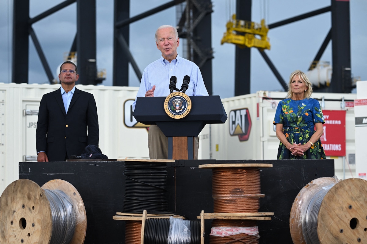 President Joe Biden, flanked by First Lady Jill Biden and Puerto Rico Governor Pedro Pierluisi, delivers remarks in the aftermath of Hurricane Fiona in Ponce, Puerto Rico