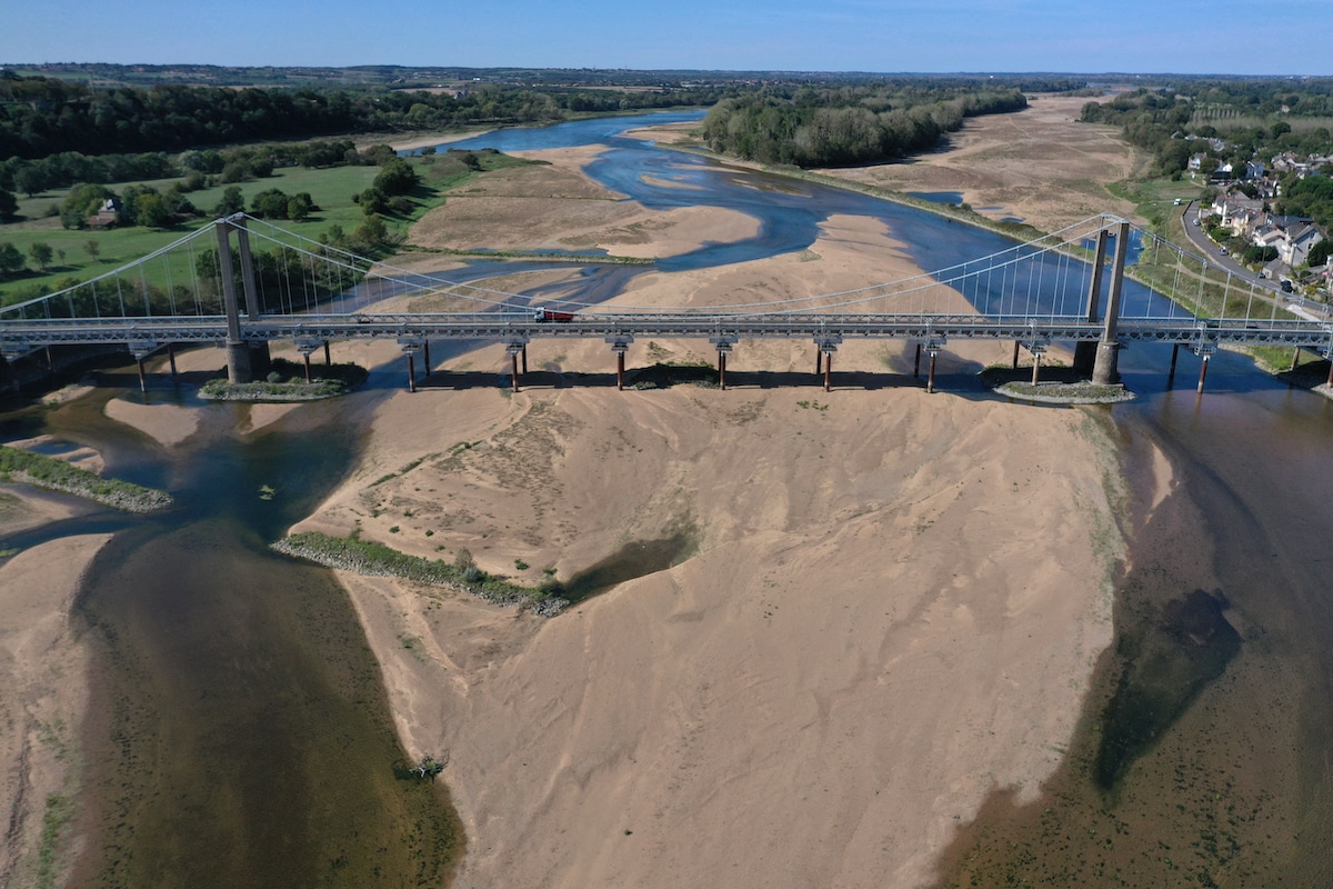A bridge over the dried-up Loire River bed at Loireauxence, western France