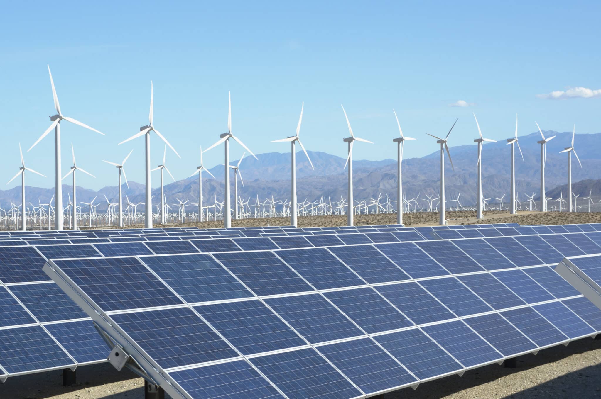 Solar panels and wind turbines Photovoltaic solar panels and wind turbines, San Gorgonio Pass Wind Farm, Palm Springs, California, USA