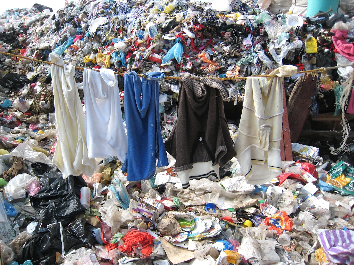 Clothes in a rubbish dump