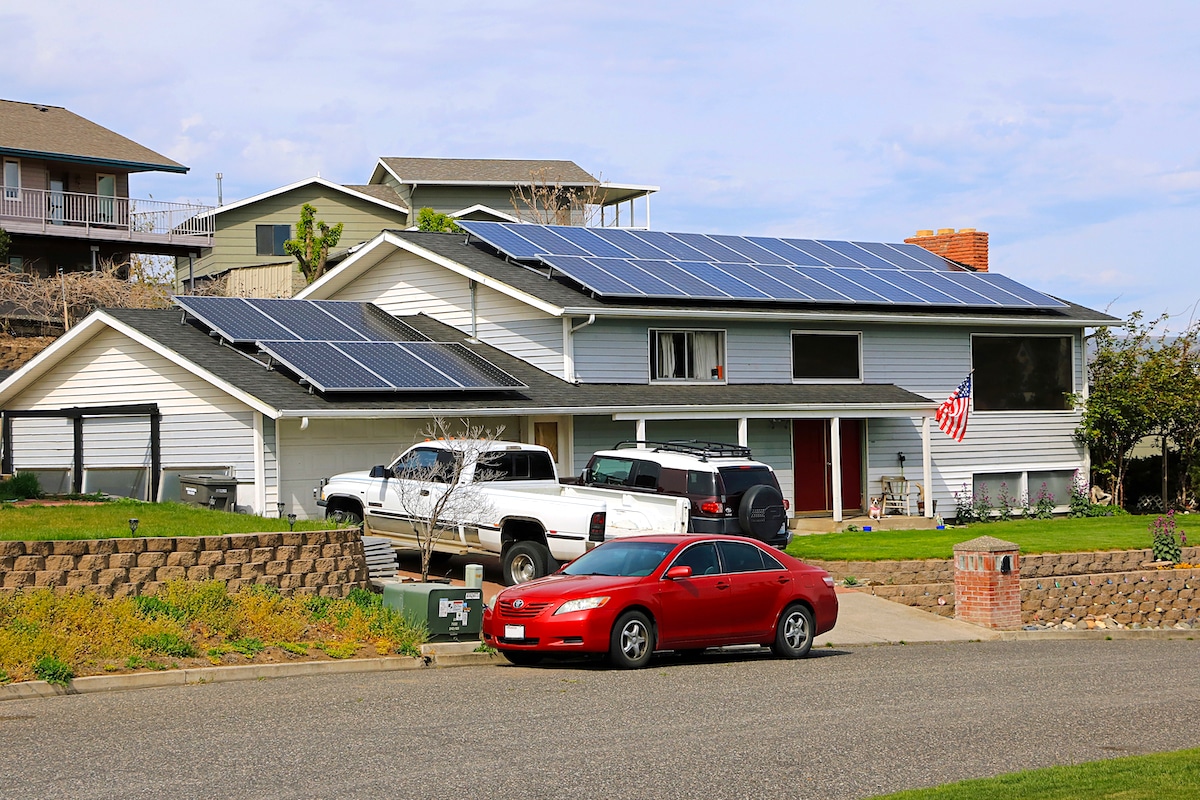 A private residence with rooftop solar panels covering much of the roof
