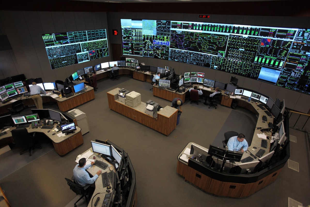 Dispatch team members working in the PJM Interconnection control room