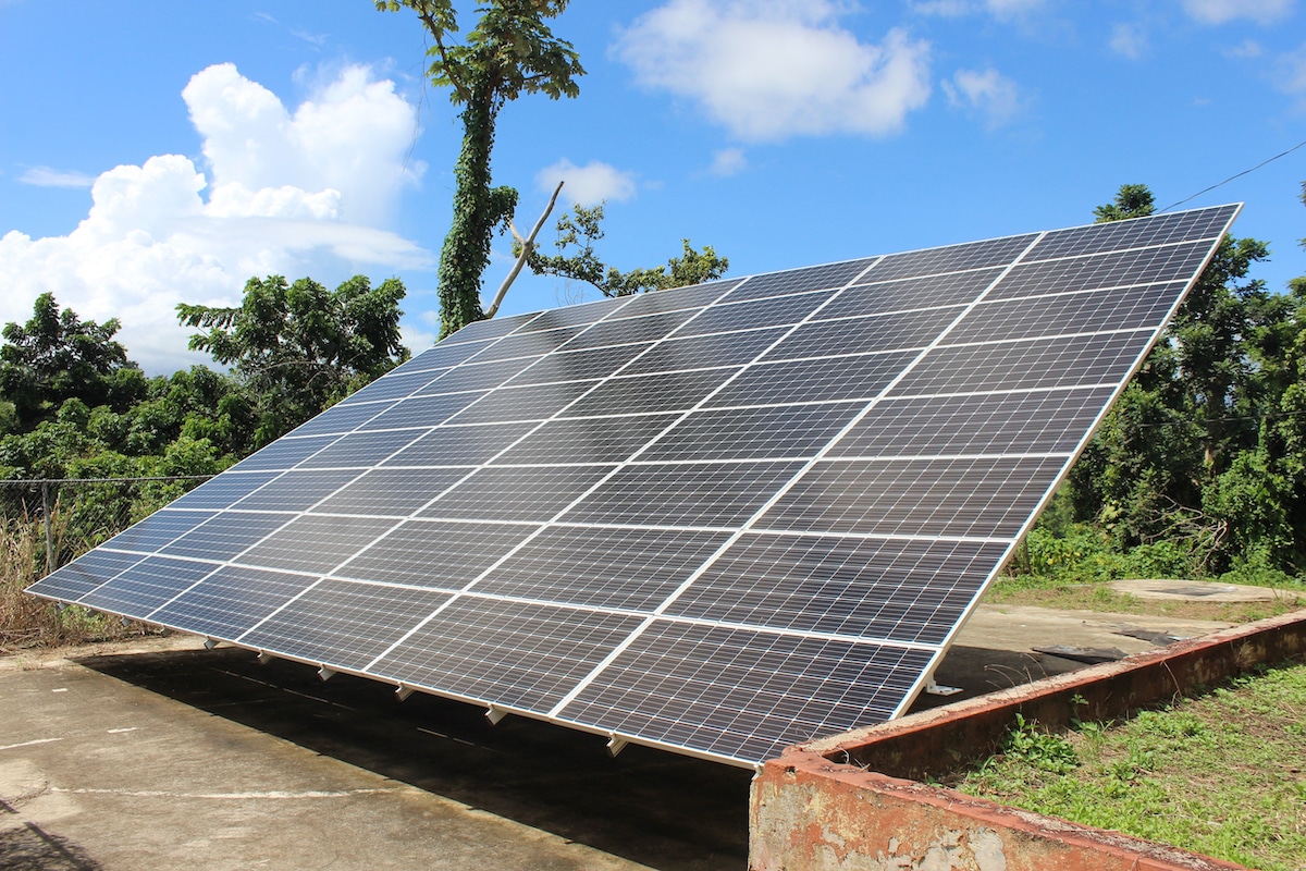 Solar panels supply energy to a community center and school in Puerto Rico