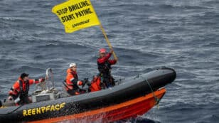 Greenpeace Activists Occupy Shell Oil Platform on North Sea Bound Vessel 