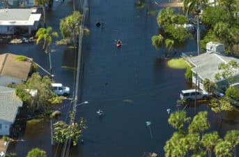 Unaccounted Flood Risks Threaten Low-Income Home Values Most