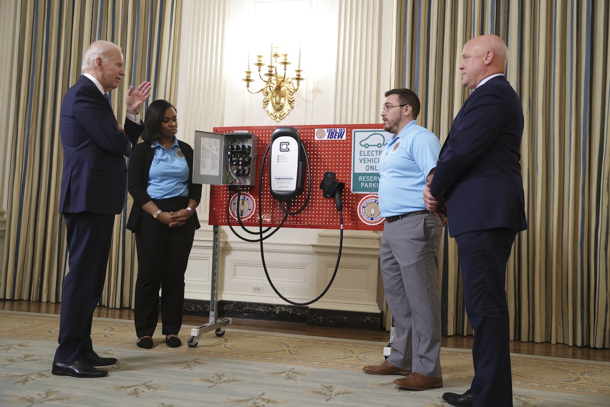 President Joe Biden views an EV charging station at the White House