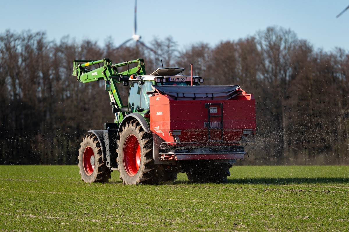 A farmer applies nitrogen fertilizer to a field in Germany